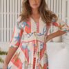 Close-up of Jaase Indiana Long Island dress – print and decorative tie