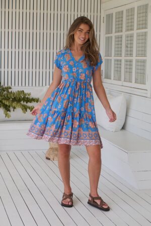 Front view of Jaase Tracey dress in Sunseeker print – vibrant floral on deep bluezul intenso