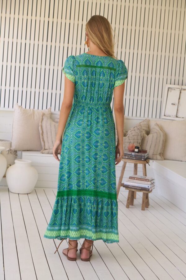 Back view of the Jaase Carmen dress in Tranquility print – lace detailing on the back and shirred waistline