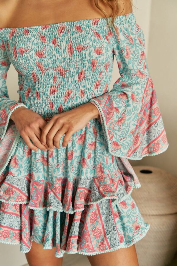 Close-up of the Malibu print and ruffle details on the Jaase Primrose dress