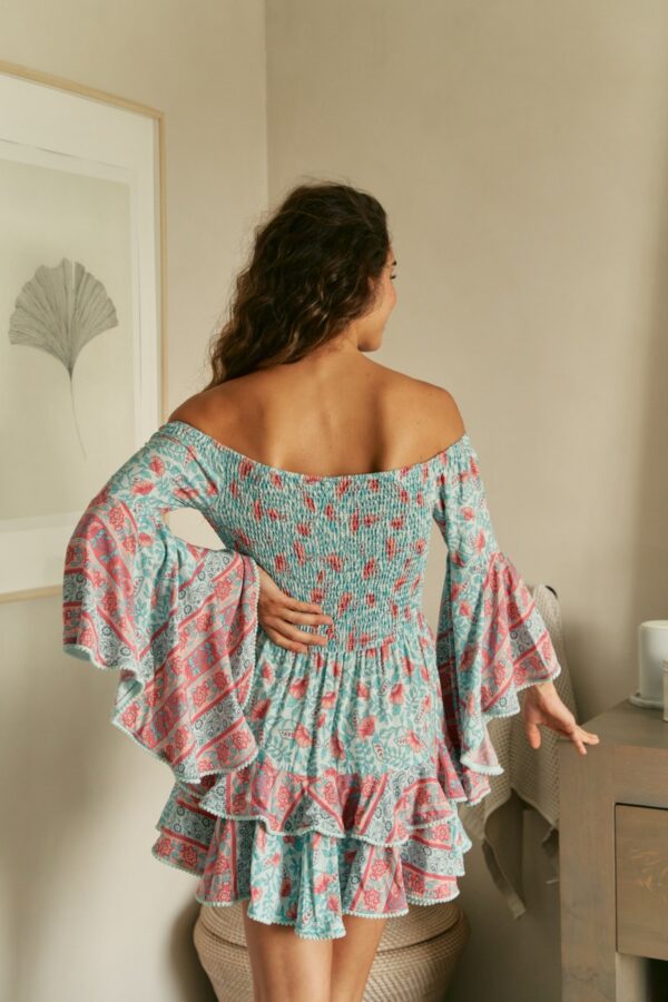 Back view of the Jaase Primrose dress in Malibu print showing off the shoulder-baring design
