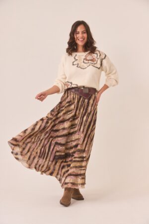 Front view of asymmetric skirt by Spanish brand Nekane in flowing fabric and earthy tones