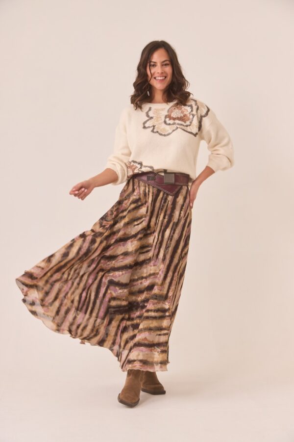 Front view of asymmetric skirt by Spanish brand Nekane in flowing fabric and earthy tones