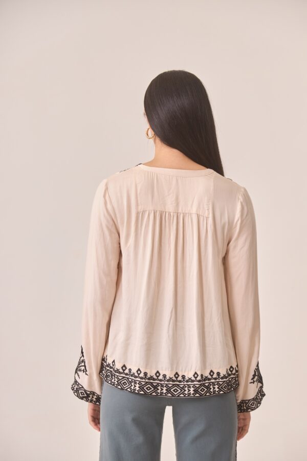 Back view of the embroidered Mimosa blouse by NKN Nekane